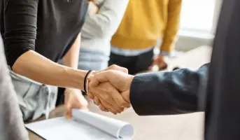 Handshake after a retirement planning consultation