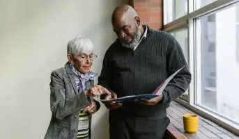 Advisor reviewing retirement documents with a client